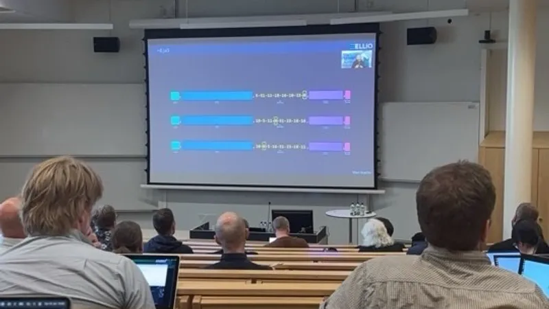 Conference presentation showing network fingerprints displayed on large screen to audience of security professionals at BSides UME 2025